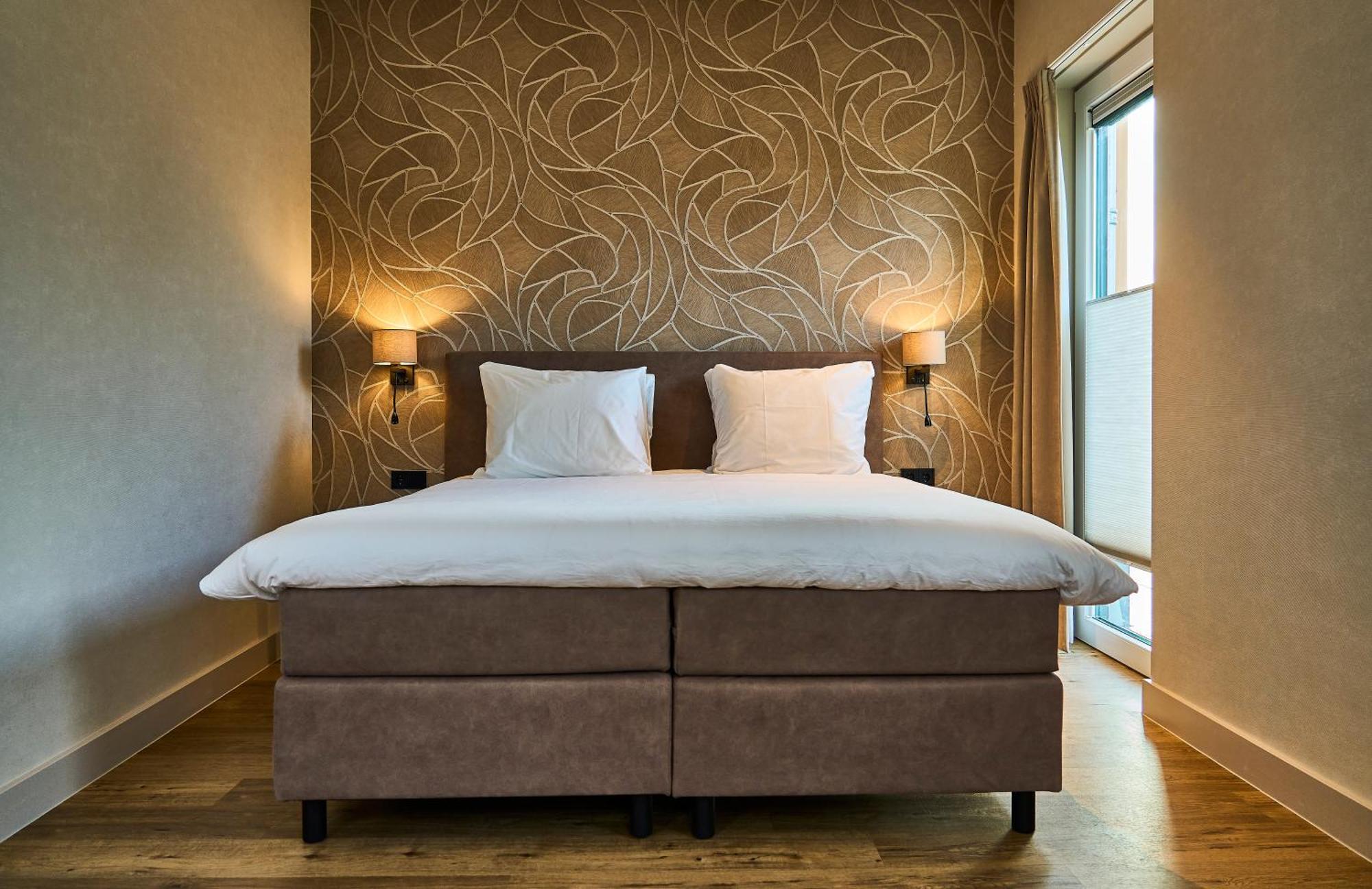 Eilandhotel Texel Де-Коксдорп Экстерьер фото A boxspring bed